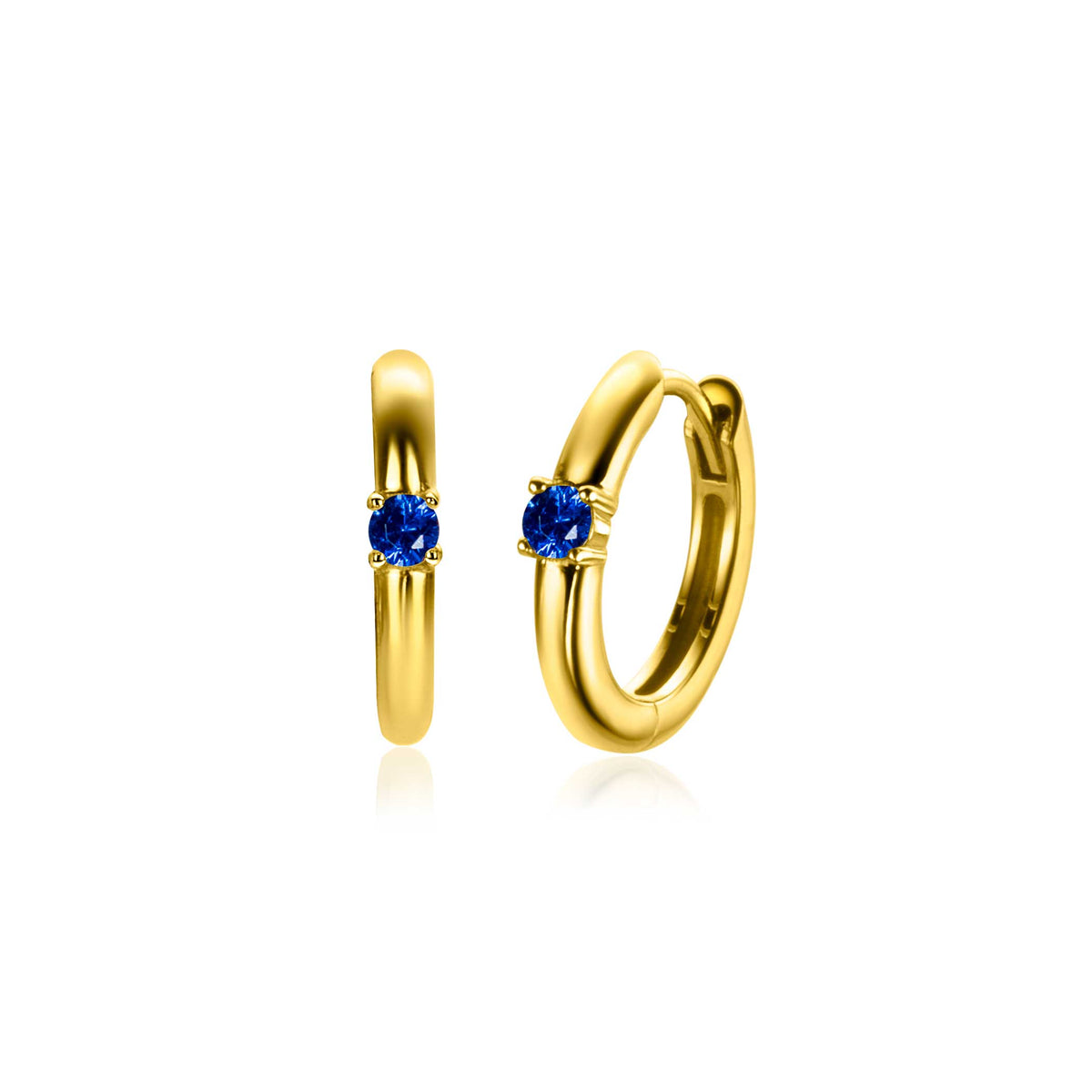 Orecchini alla creola placcati oro con pietra blu centrale.