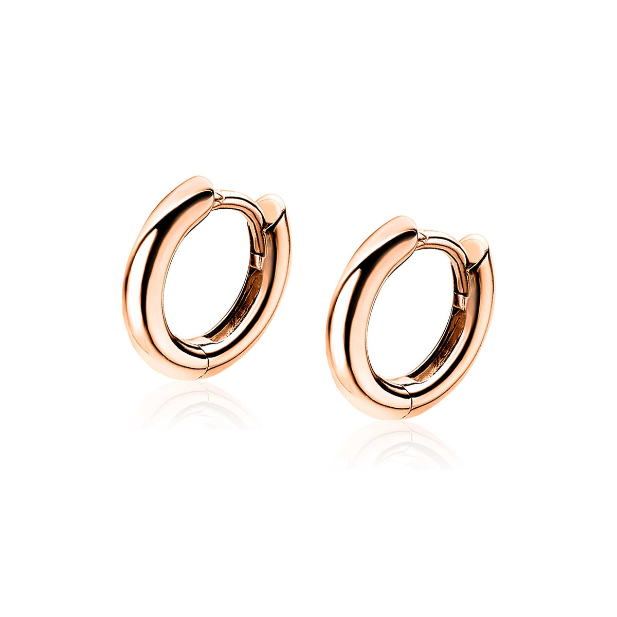 Orecchini in oro rosa placcato, a forma di cerchio, con finitura lucida.