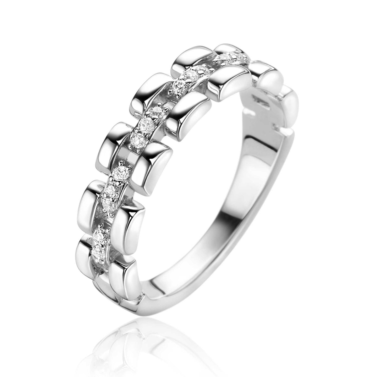 Anello in argento con dettagli bombati e pietre brillanti incastonate.