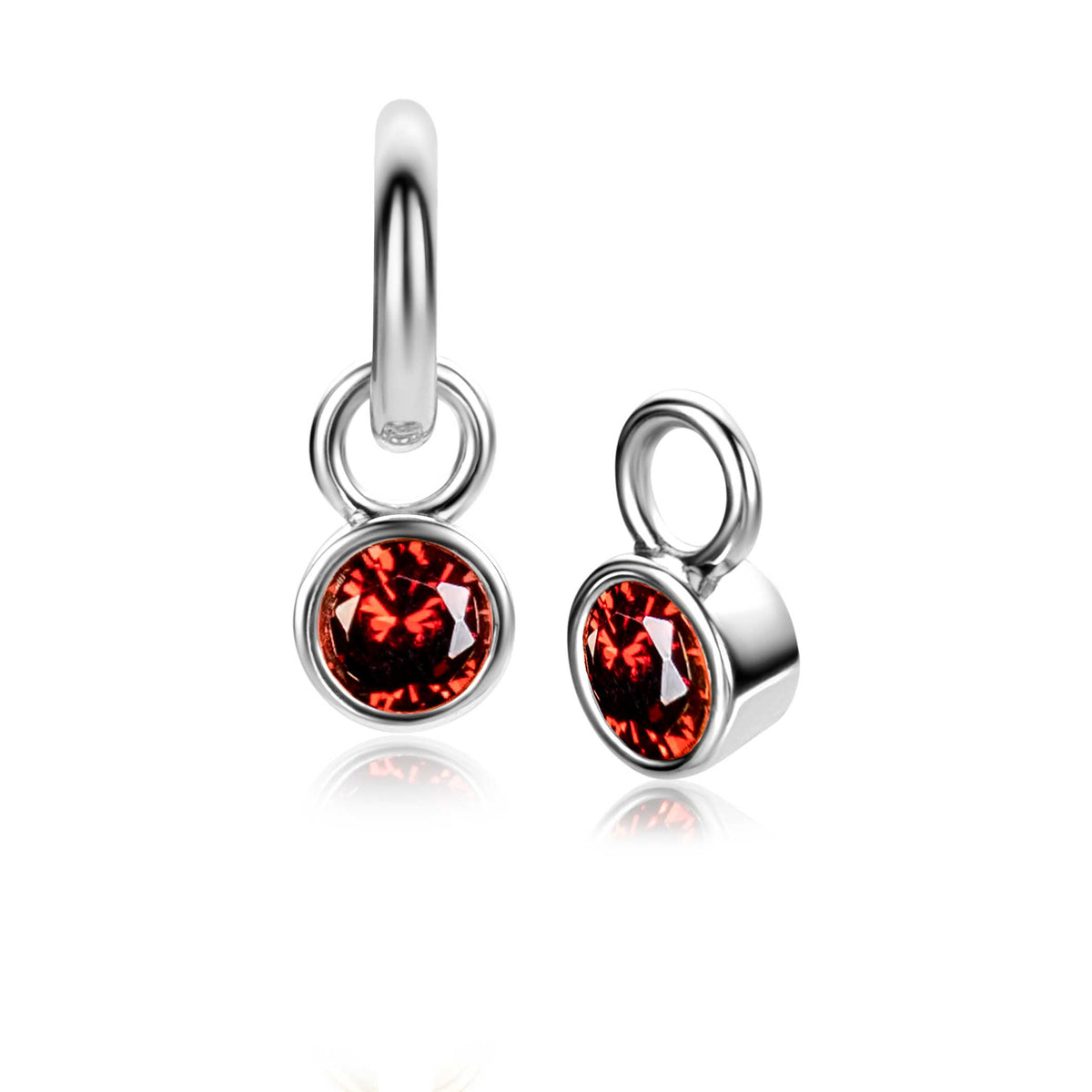 Orecchini in argento con pietra rossa rotonda incastonata.