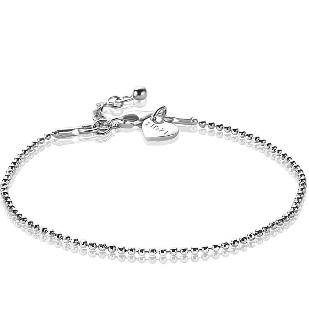 De Zinzi Armband Zilver Zia1909 is een delicate armband met een kralenketting en een hartvormig bedeltje met de tekst Life is a special occasion. De sluiting is verstelbaar, zodat u de armband op maat kunt maken.