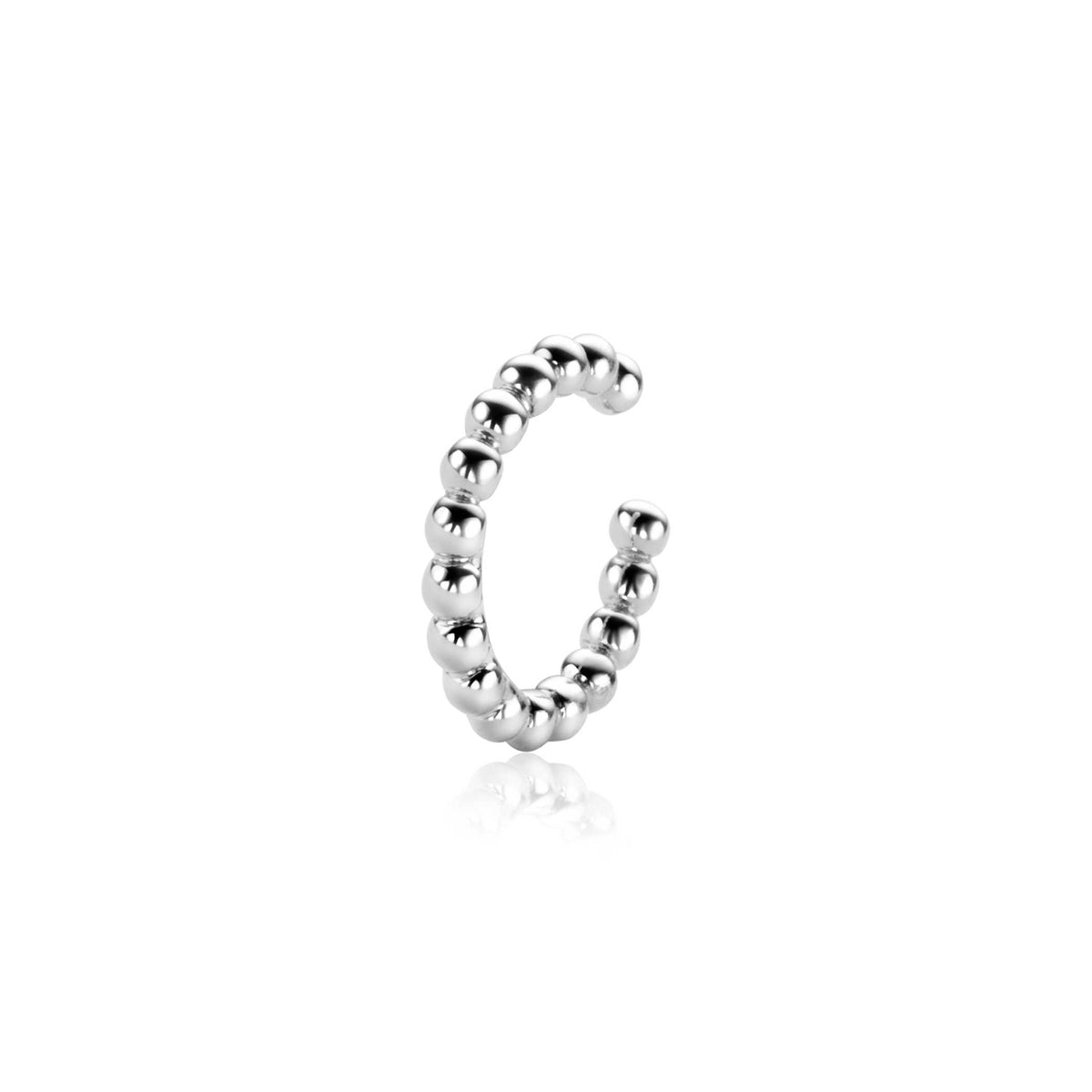 Orecchino in argento a forma di cuff con perline rotonde.