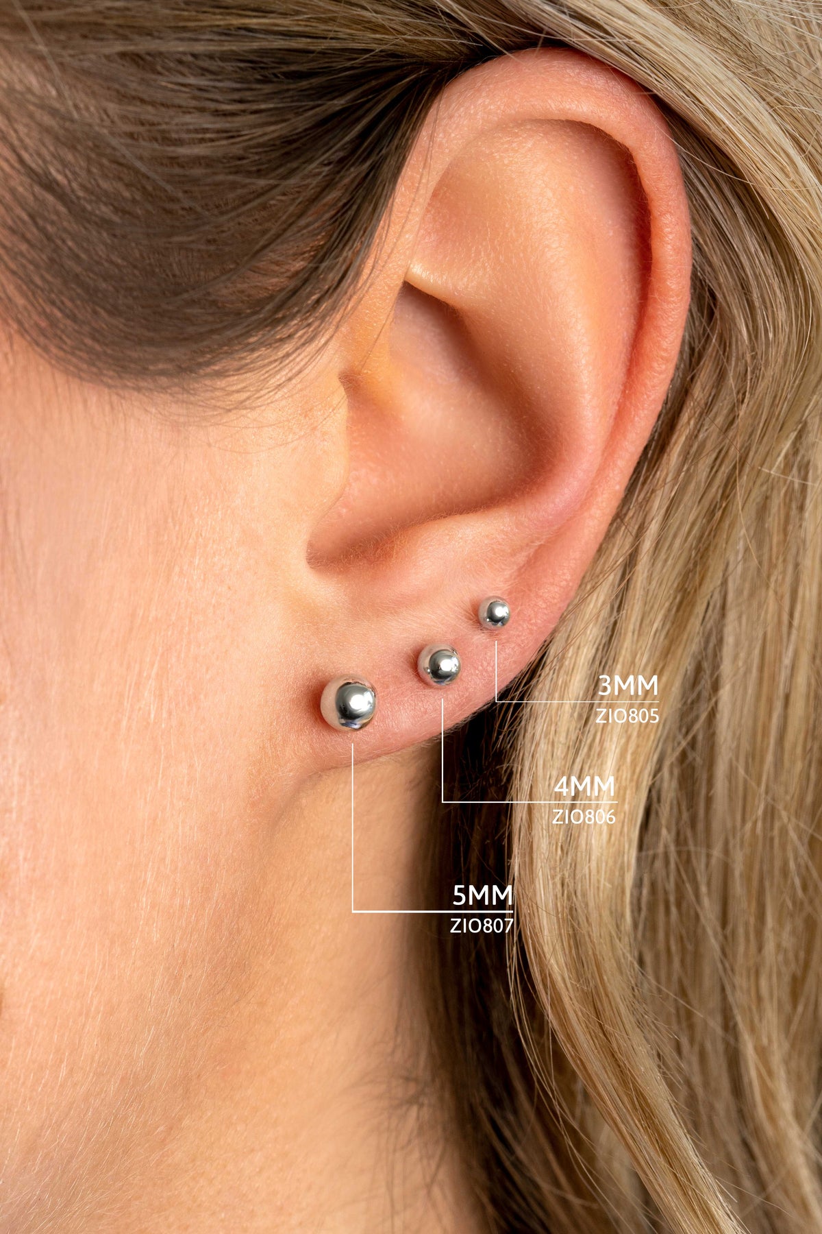 Orecchini in argento con sfere di diverse dimensioni, 3mm, 4mm e 5mm.