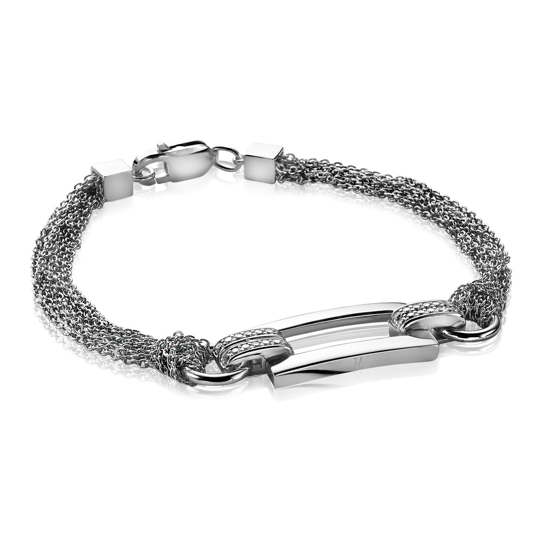De Zinzi Armband Zilver Mva4 heeft een geweven kettingontwerp met twee gepolijste metalen staven in het midden en een karabijnsluiting. Deze armband combineert een eigentijdse stijl met elke gelegenheid en is ideaal voor fans van de esthetiek van Mart Visser.