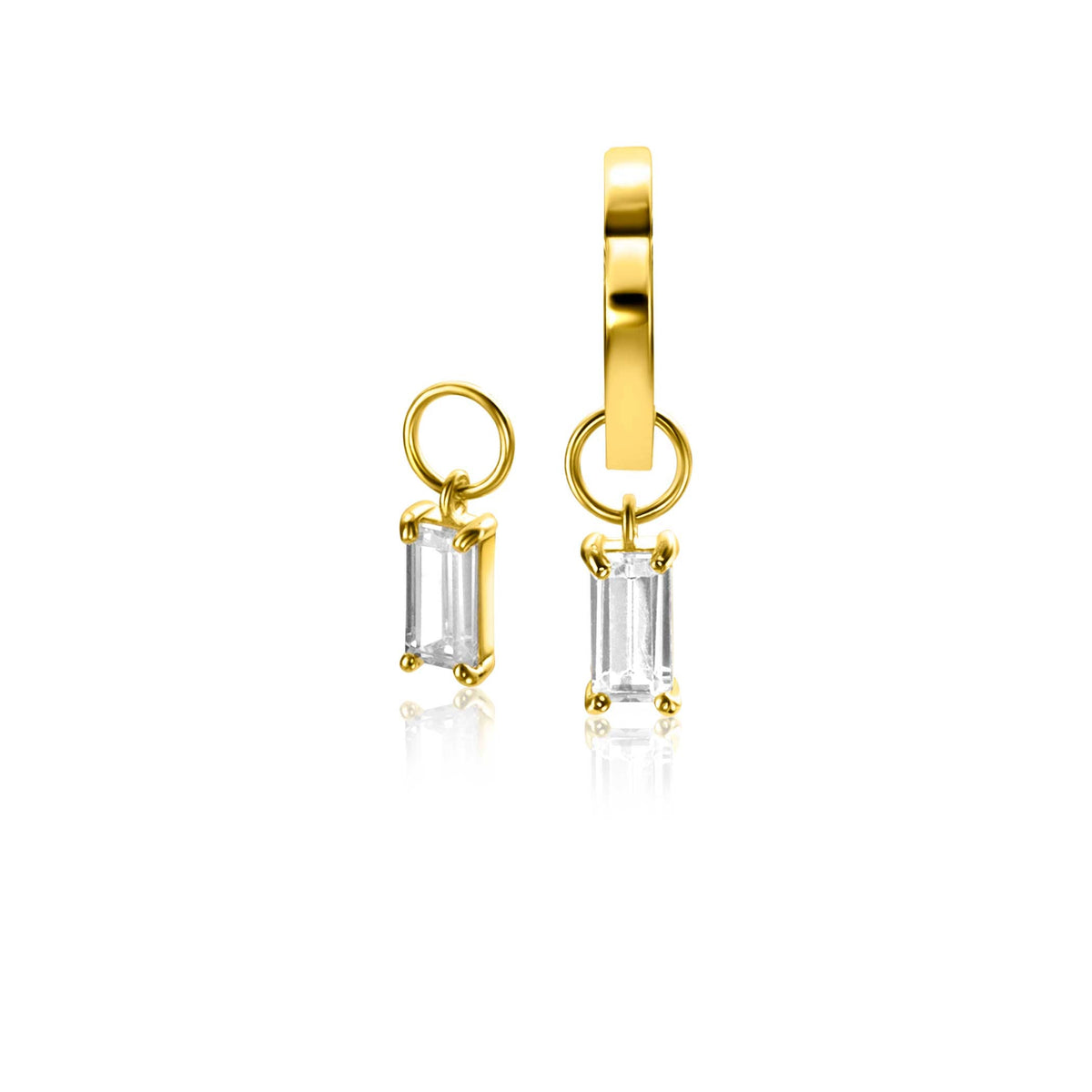 Orecchini in oro con pendente rettangolare trasparente.