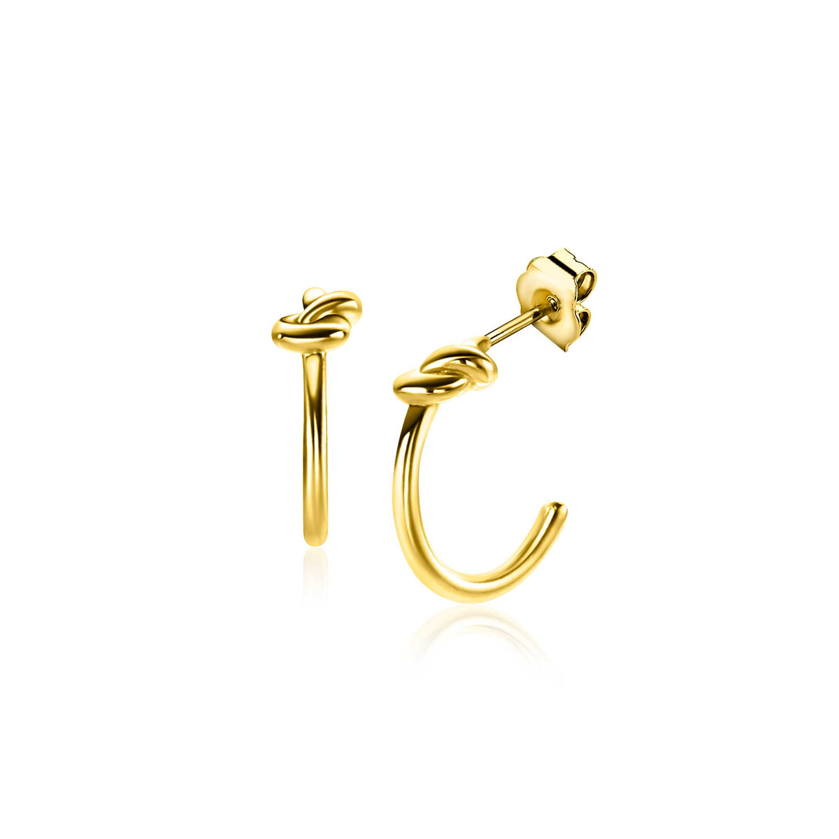 Orecchini alla creola in oro con nodo decorativo.