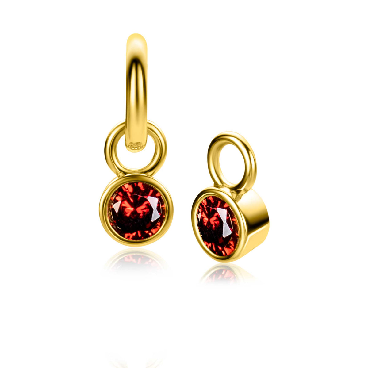 Orecchini in metallo dorato con pietra rossa brillante.