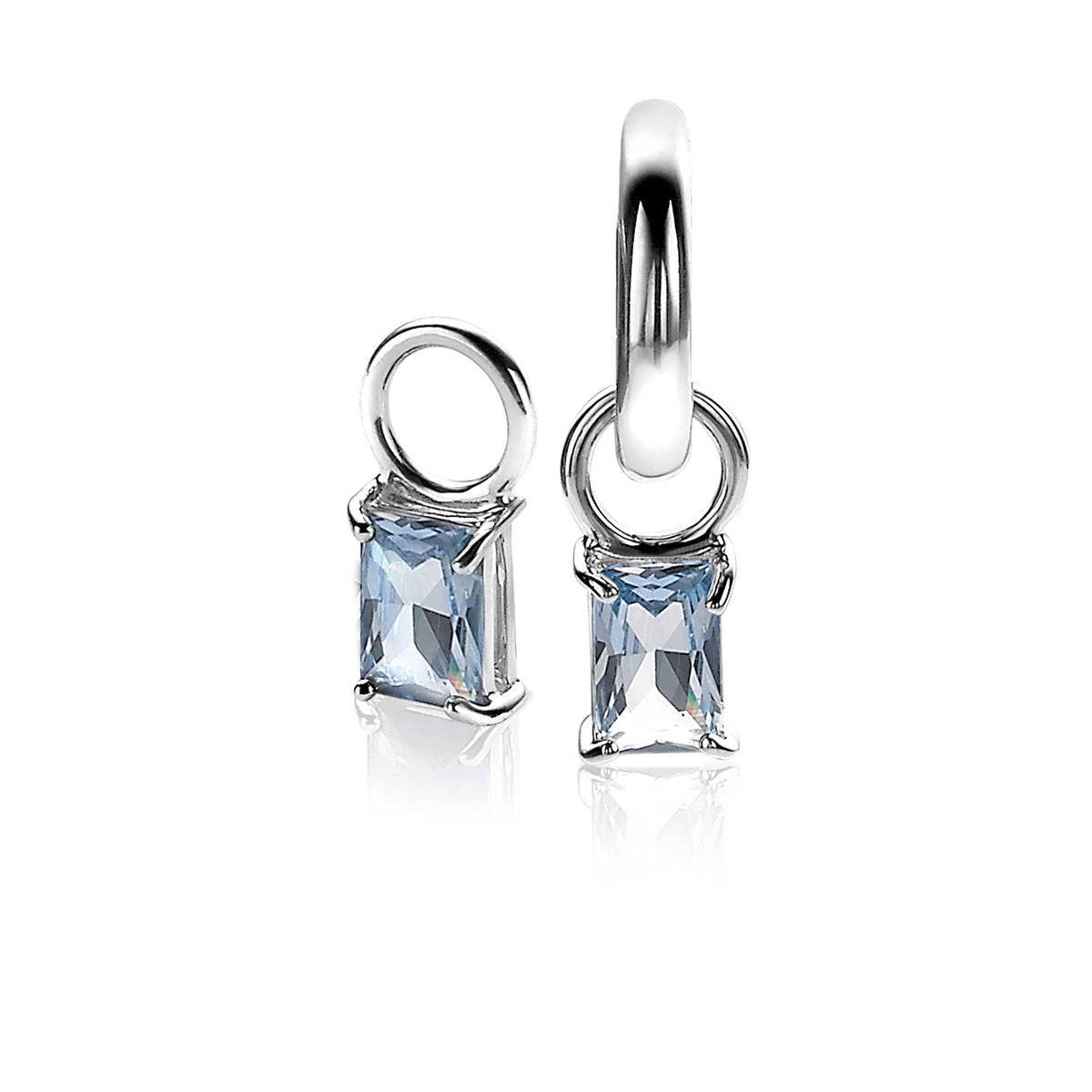 Orecchini in argento con pietra rettangolare azzurra e chiusura a cerchio.