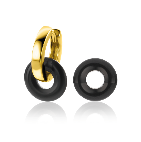 Orecchini alla creola in oro con elementi neri a forma di anello.
